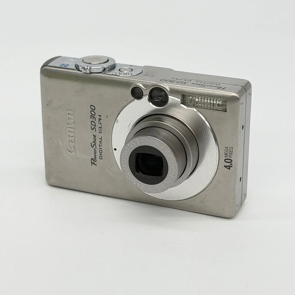Canon PowerShot SD300 Digital ELPH 4.0MP Silver Camera Bundle SD Charger READ